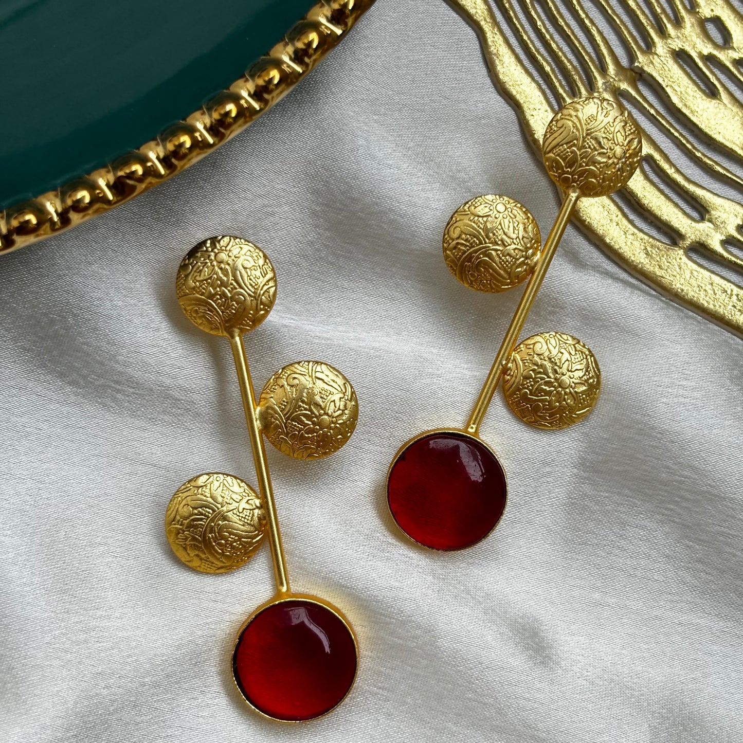 Barqin gold earrings