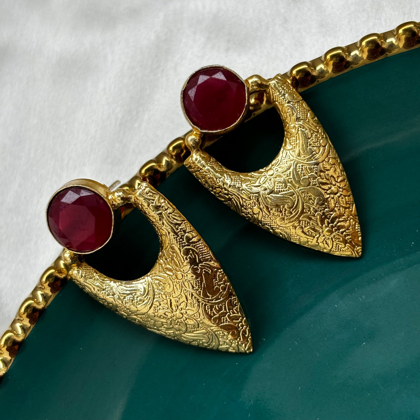 Roop gold earrings