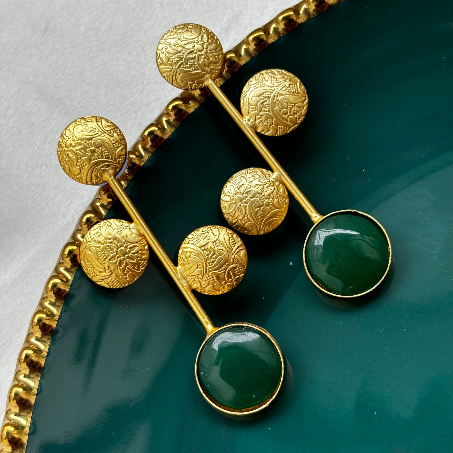 Barqin gold earrings