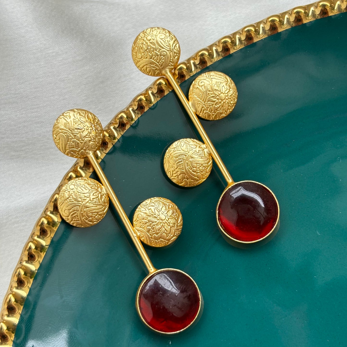 Barqin gold earrings