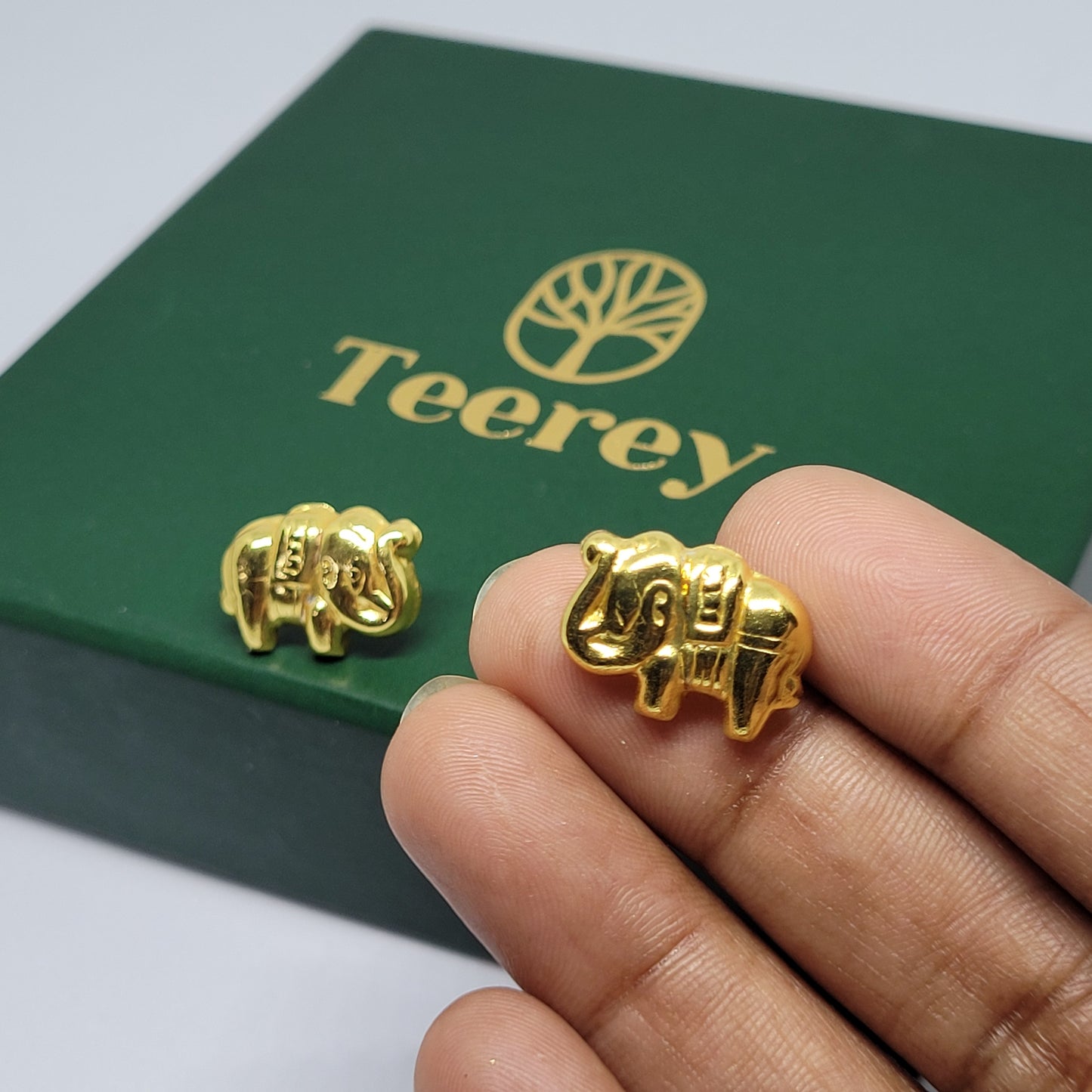 Gold TuskerStud Gold earrings